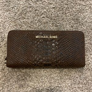 Micheal Kors brown snake embossed wallet